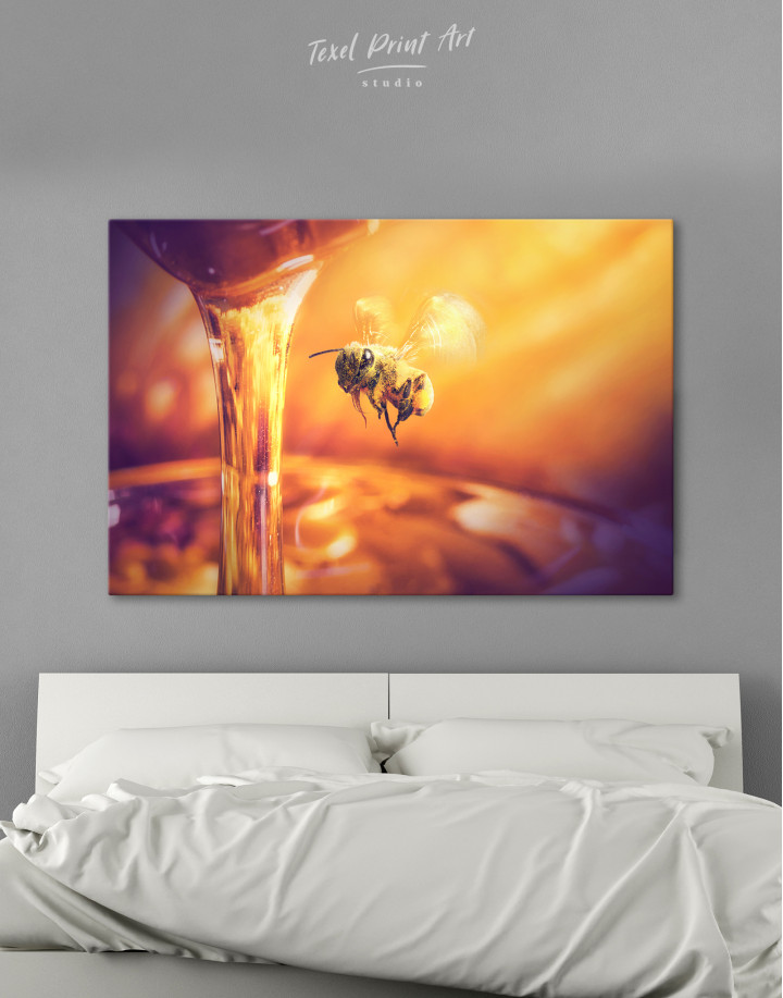 Bee flying to honey Canvas Wall Art