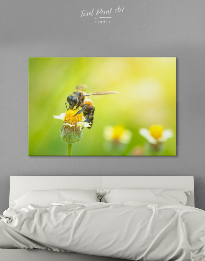 Bee flying to the beautiful flower Canvas Wall Art